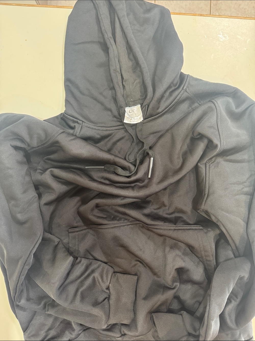 Black hoodie. Darker than pictured.